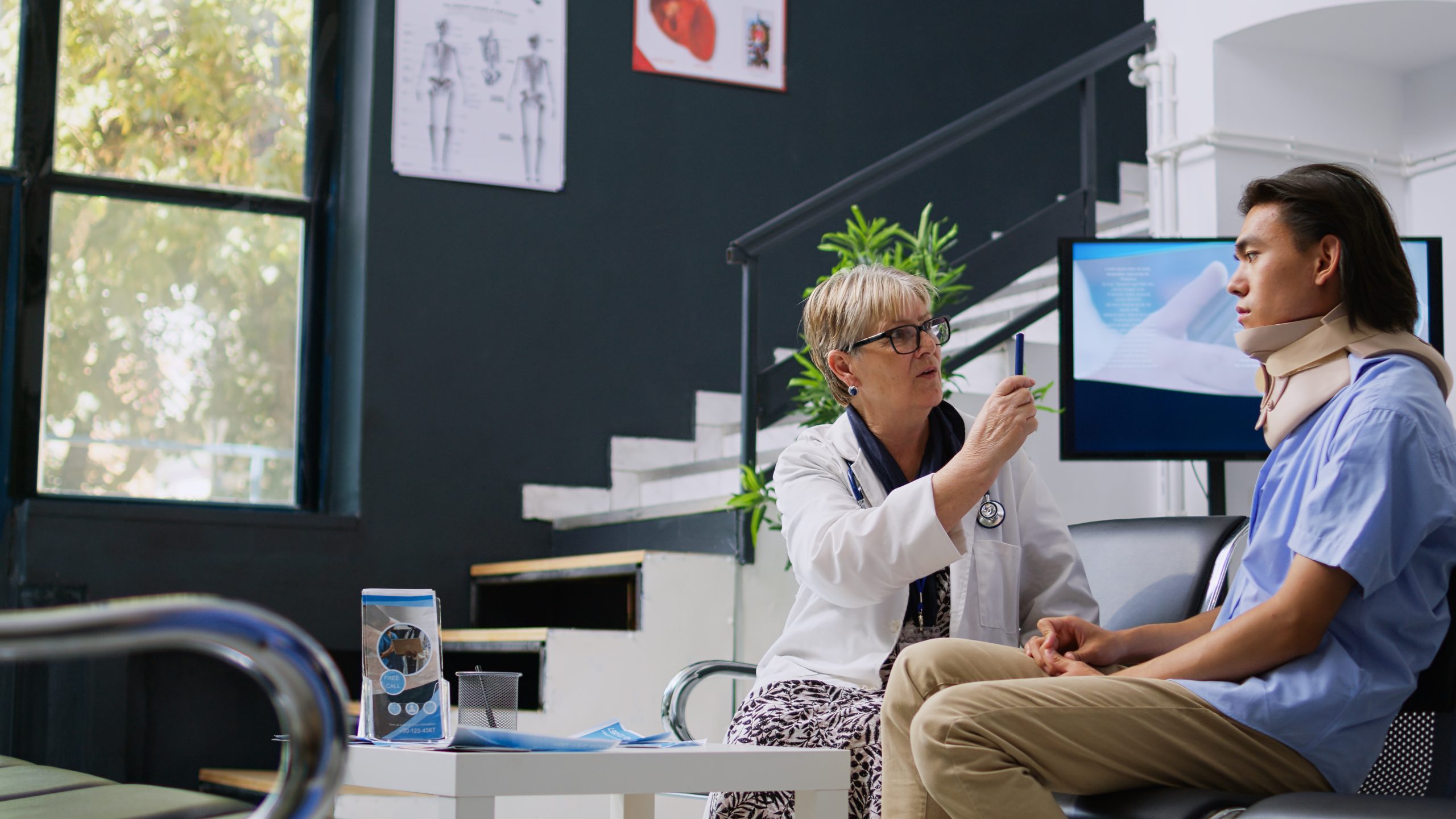 doctor-talks-patient-hospital-room-scaled.jpg