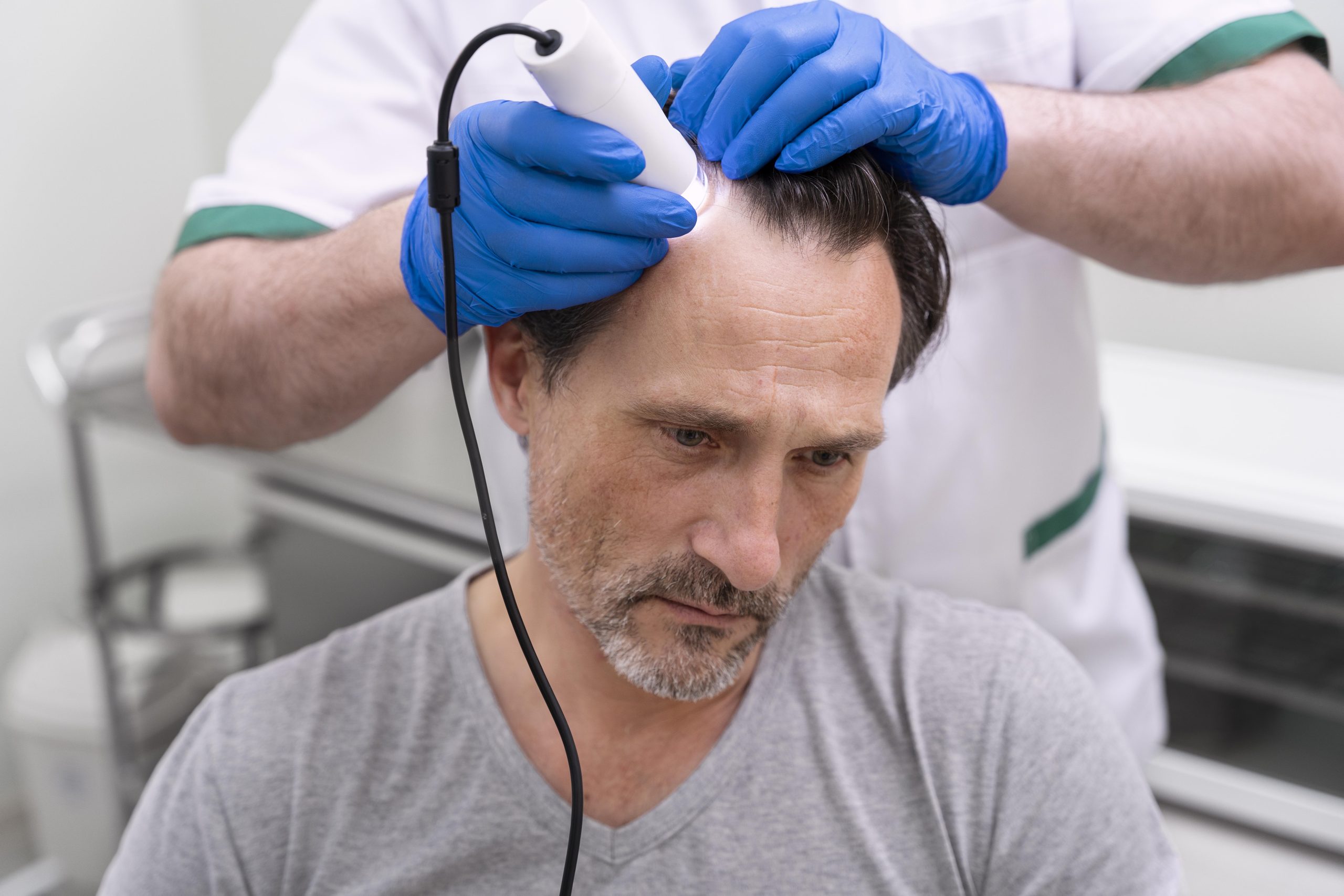 man-getting-hair-loss-treatment-scaled.jpg