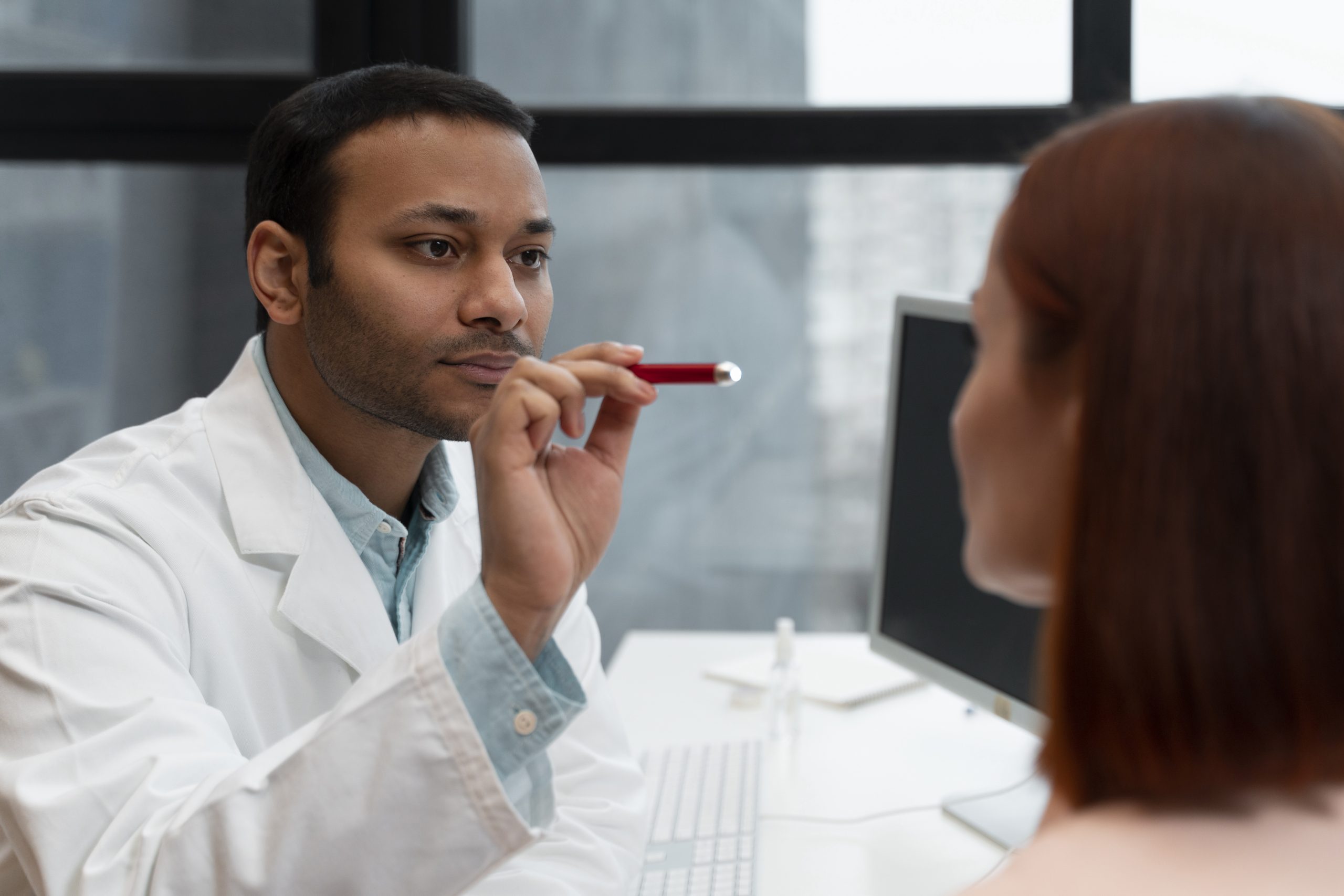 side-view-doctor-checking-patient-scaled.jpg