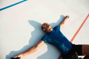 Men Laying on ground because of tiredness