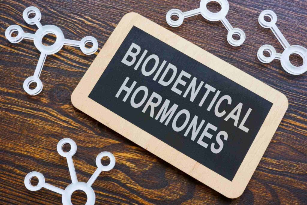 Board with 'Bioidentical Hormones' written on it.