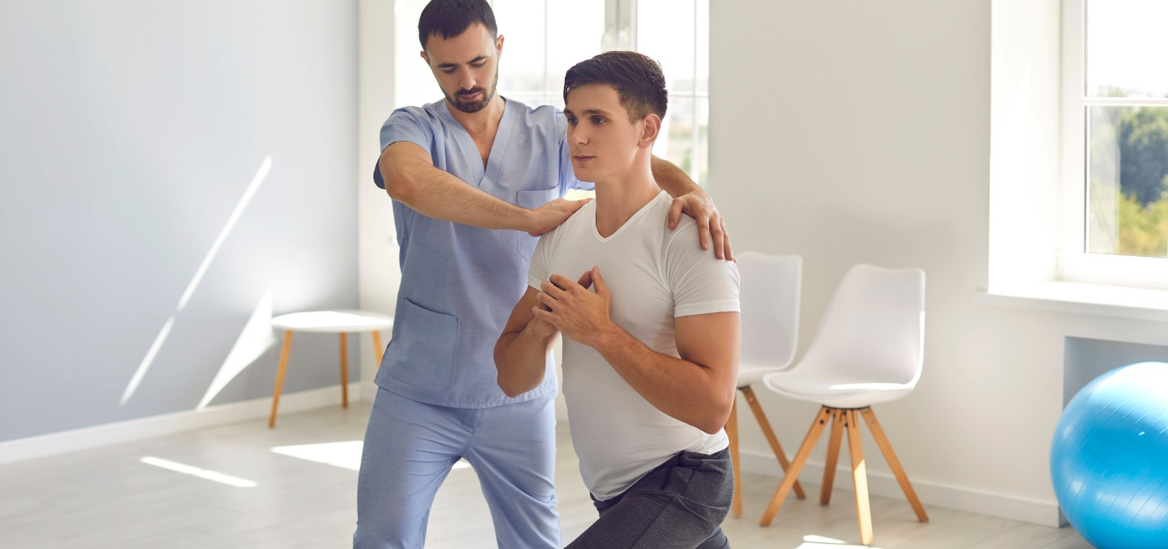 guiding a man through a lunging exercise
