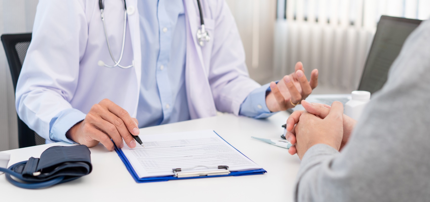 discussing medical forms with a patient